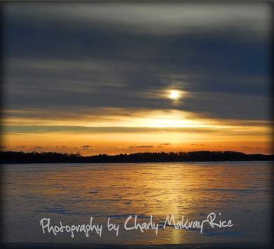Winter sunset reflects off the frozen ice of Buffalo Lake, Marquette County, Wisconsin